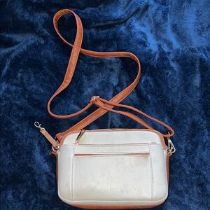 Cute tan and brown purse with adjustable strap